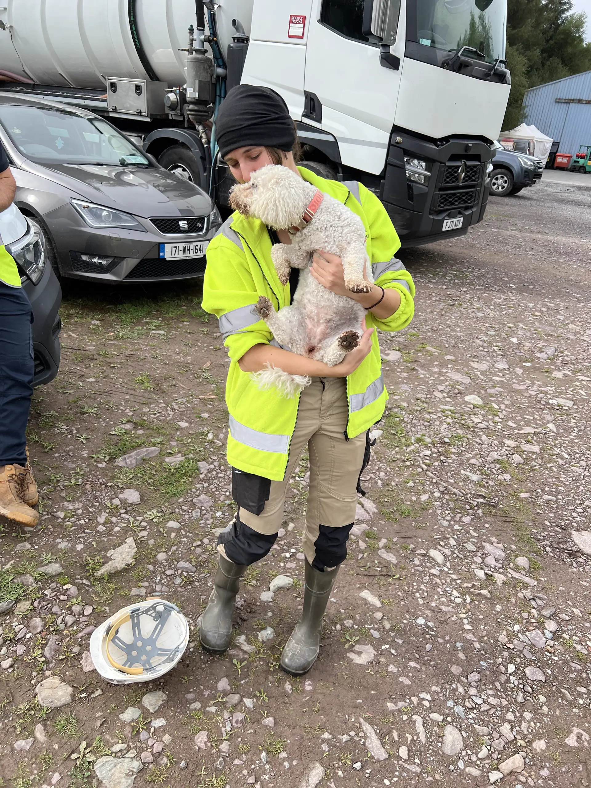 Site worker holding the Crookstown site dog