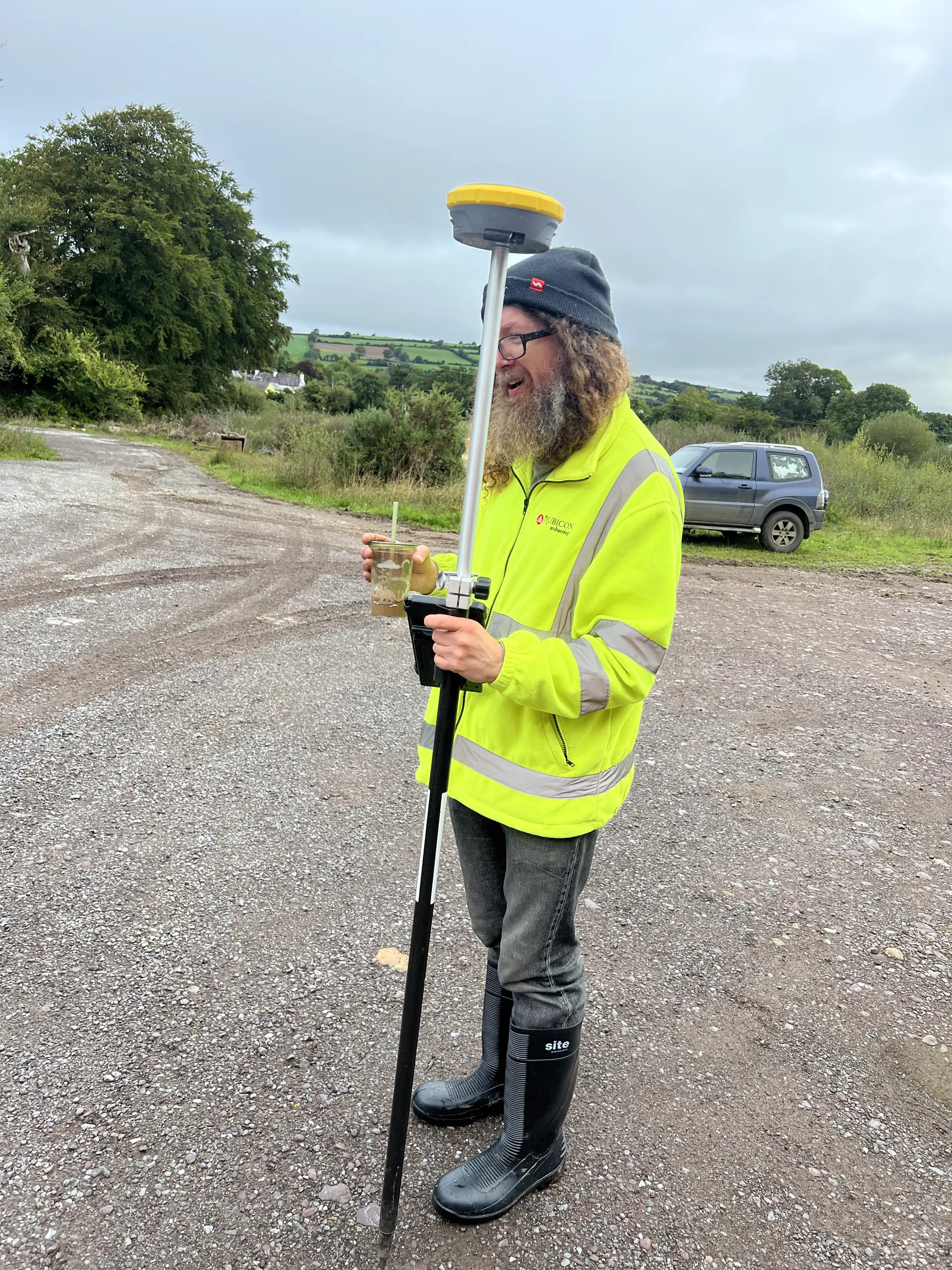 Archaeologist carrying out survey work during the Crookstown test trenching
