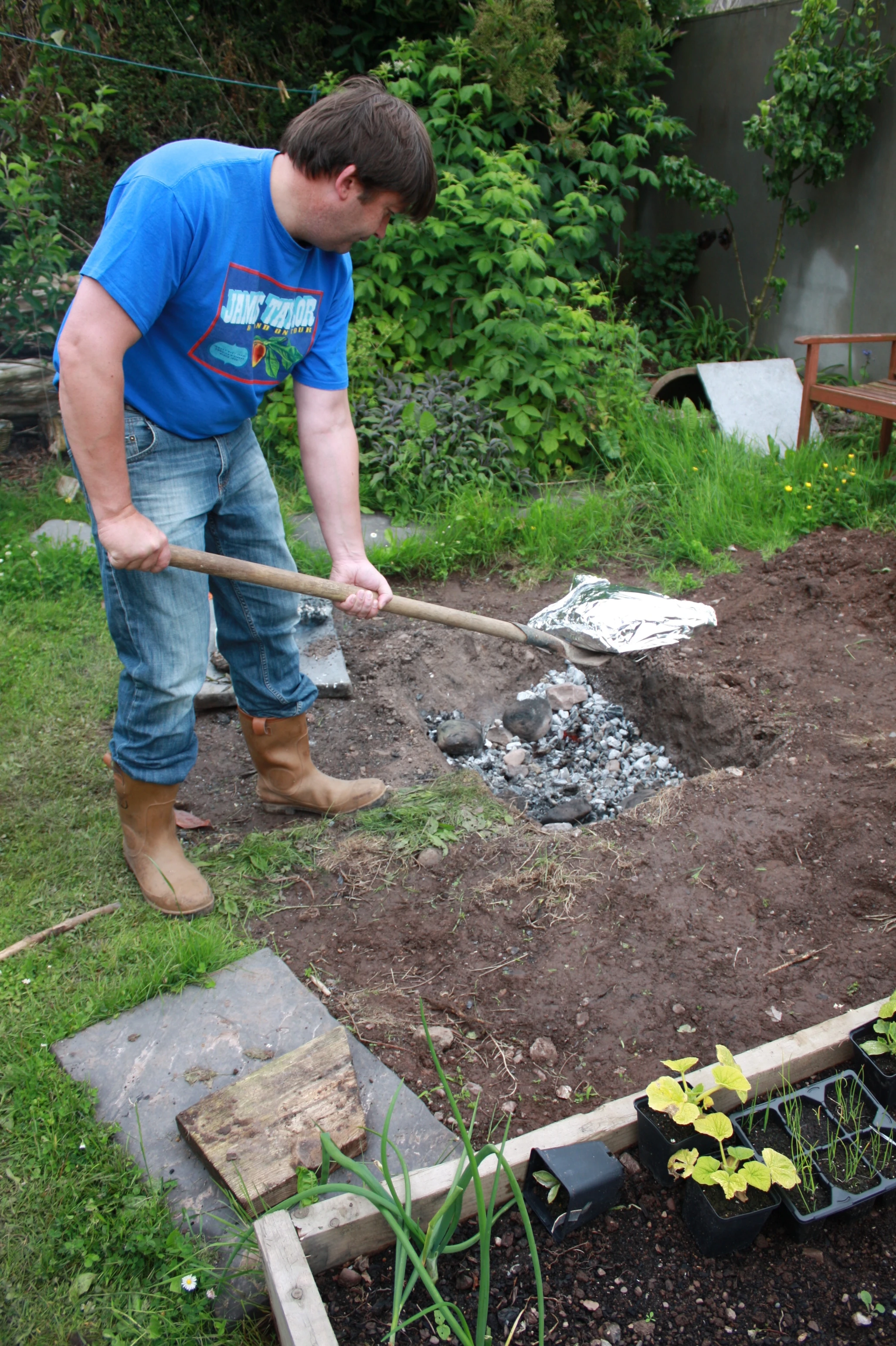 Stage 5: Wrap the meat; future experiments would test materials such as grass, reeds, bark or seaweed