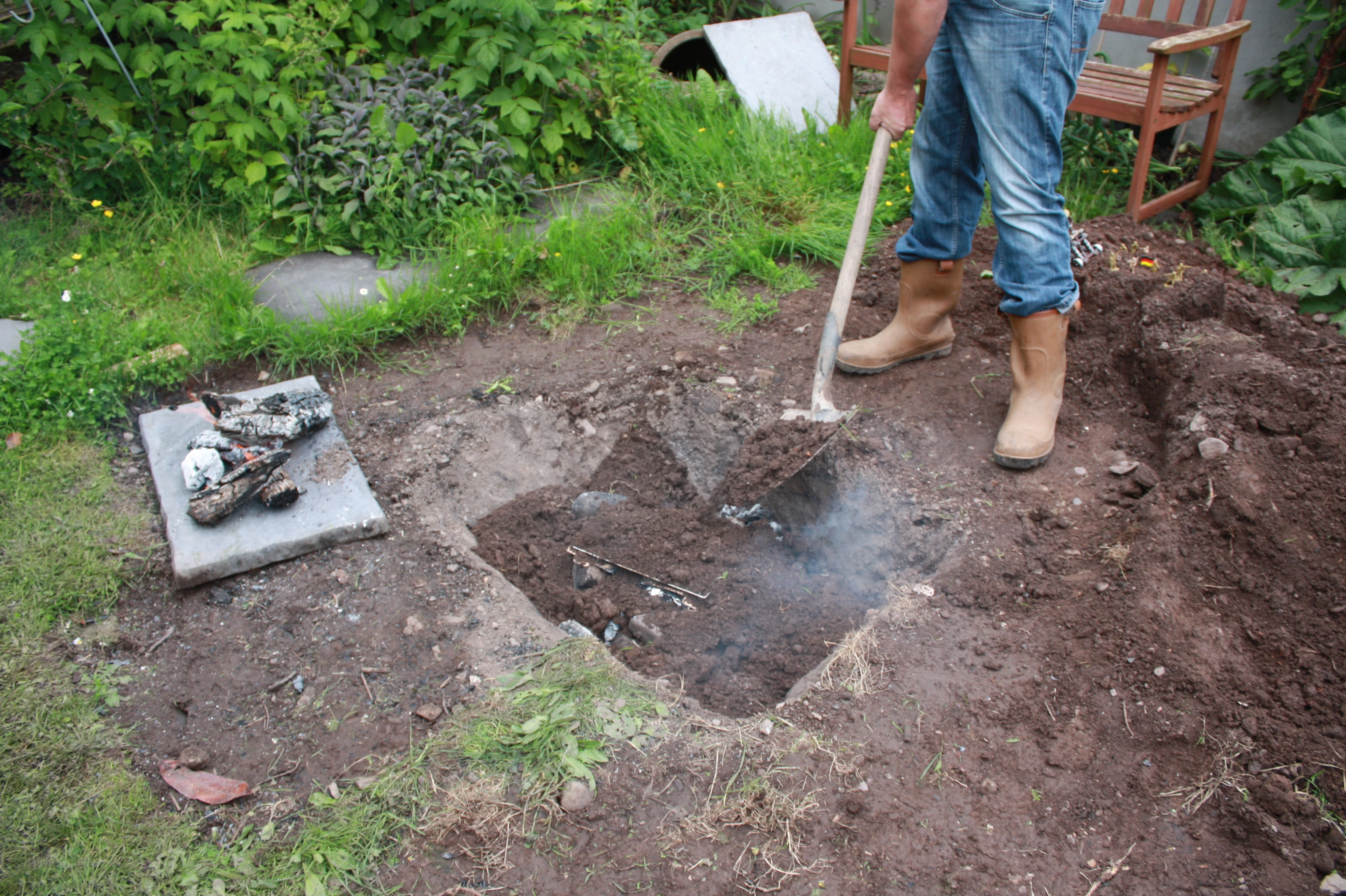 Stage 7: Backfill the pit with a thin insulating layer of soil