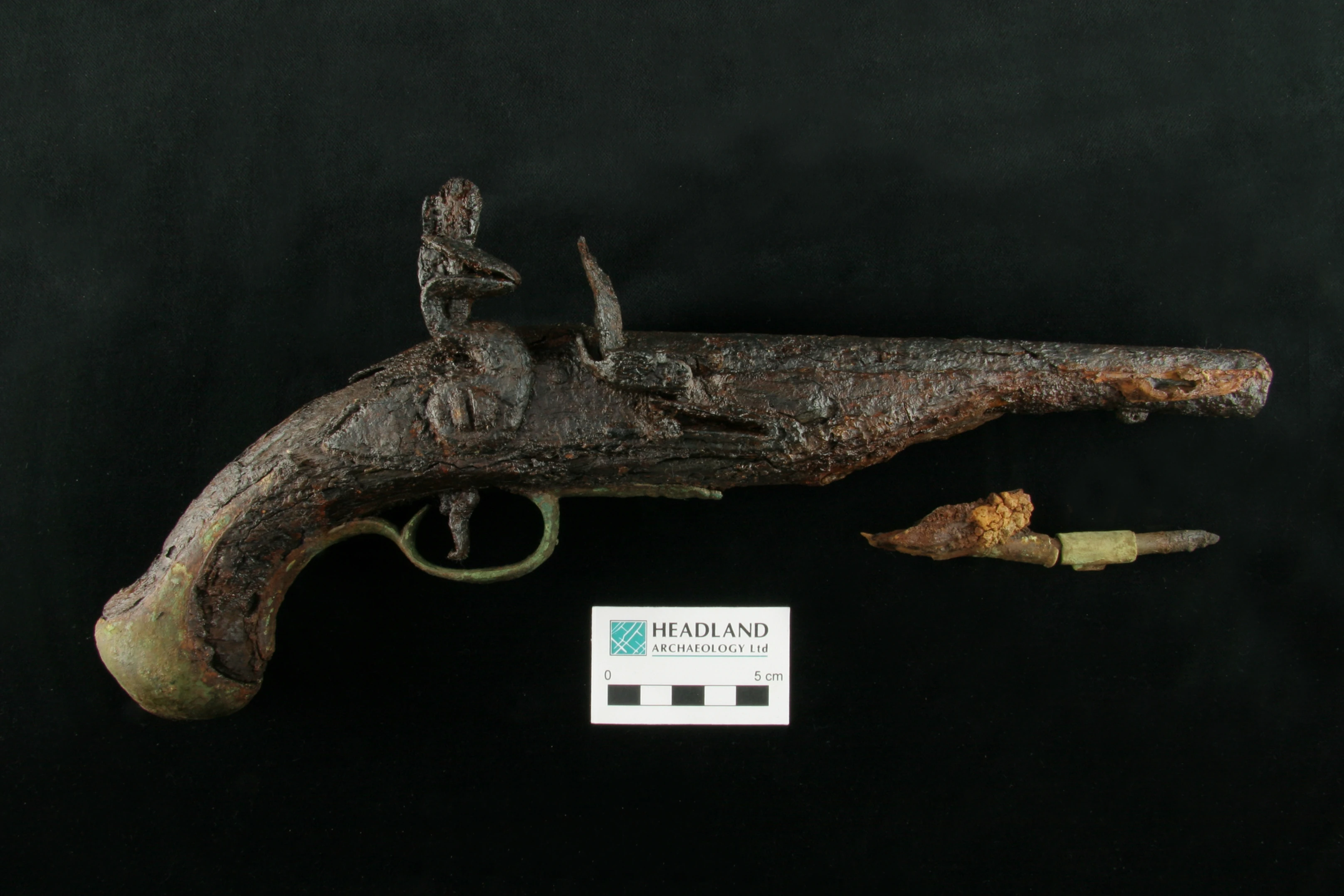 The component parts of a flintlock mechanism