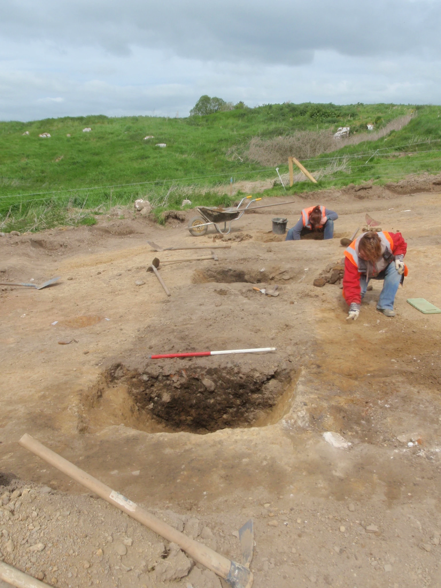 Archaeologists excavating the medieval ditch