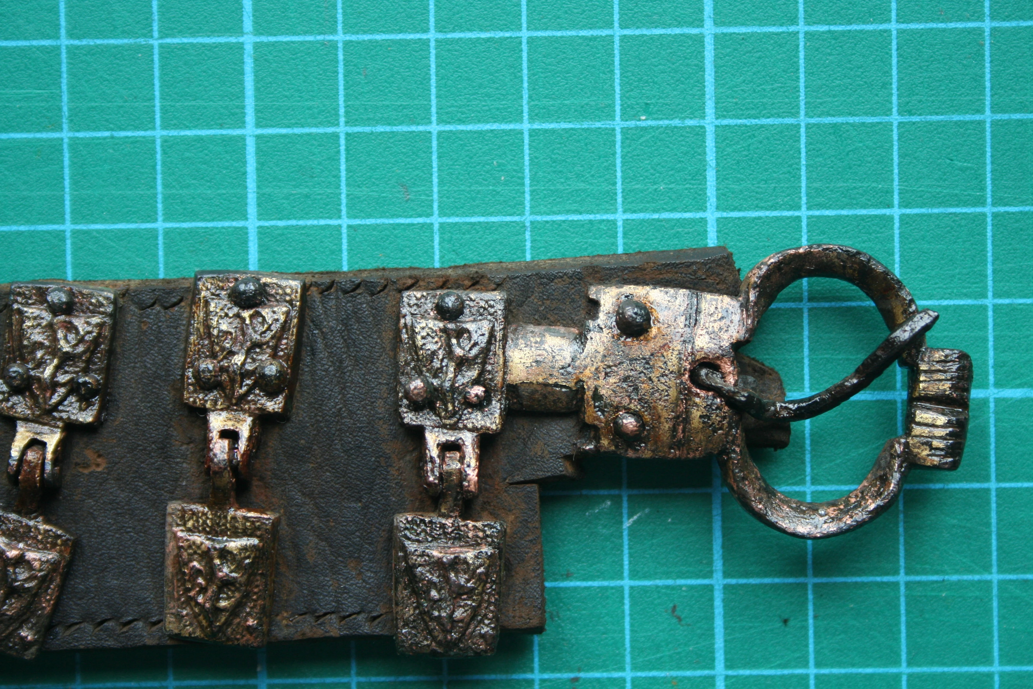 The other side of the belt with the second buckle and full view of the hinged heraldic motifs (Photo: John Nicholl)