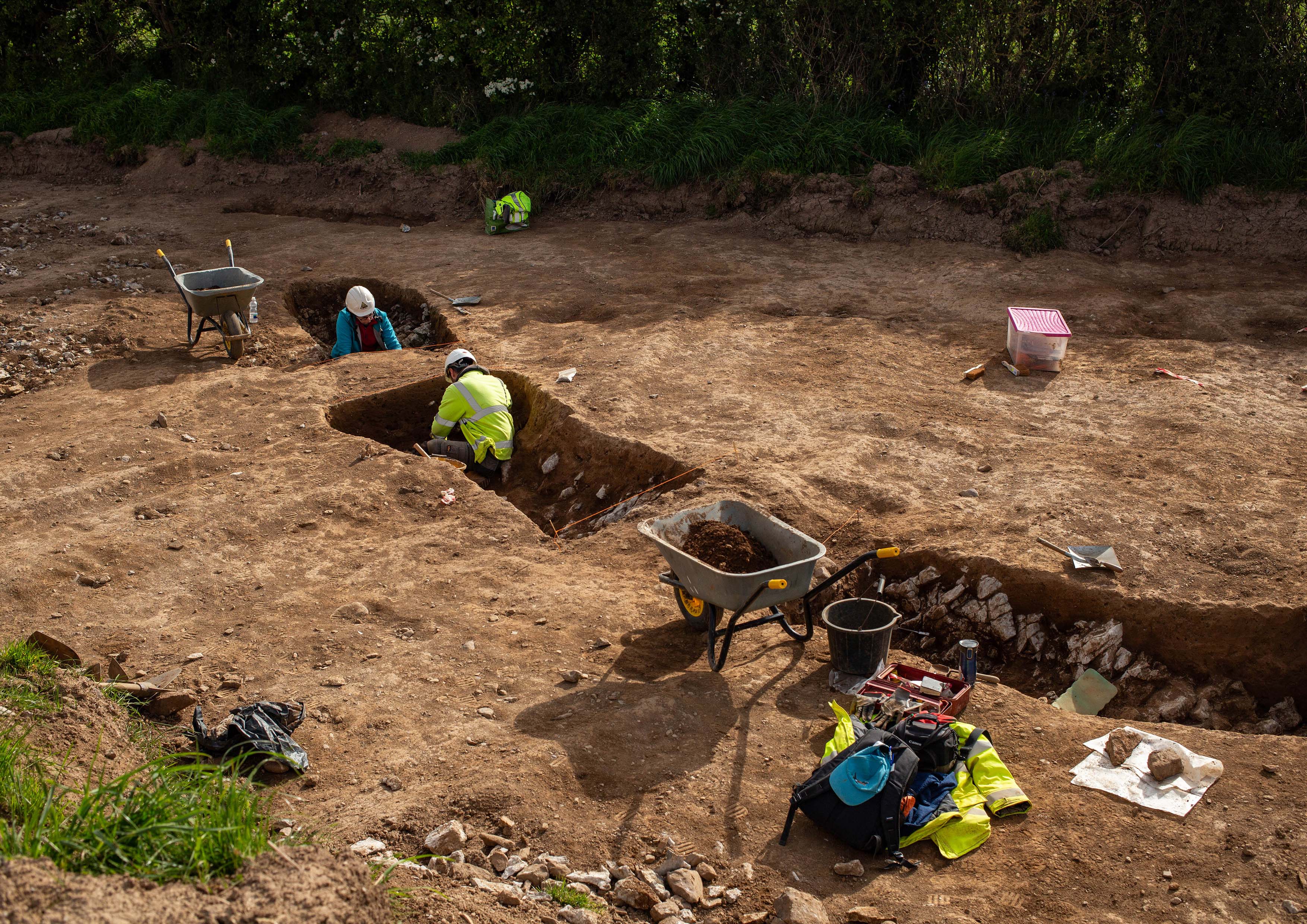 An archaeologist excavating the second ring-ditch in sections